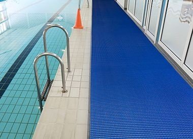 Dubai swimming pool with blue mats