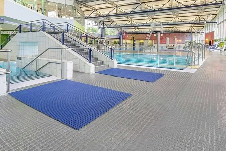 Luxury pool in Dubai with custom pool mats installed around pool
