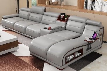 Gray leather sectional sofa with built-in storage console