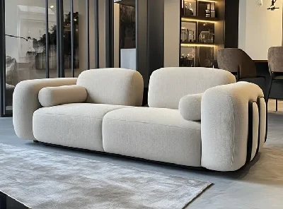 Modern beige boucle 2 seater sofa with round bolster arms