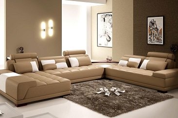 Tan leather U-shaped sectional sofa with white accents